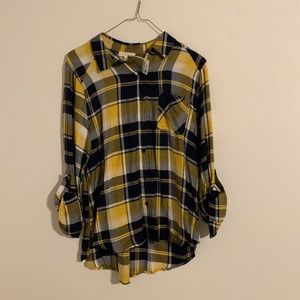 Flannel button up shirt.